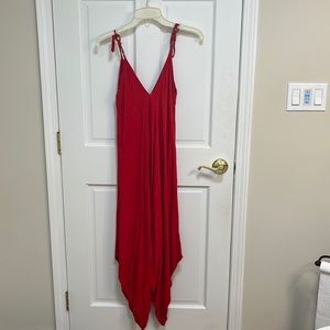 not sure what brand but a cute red romper with adjustable straps